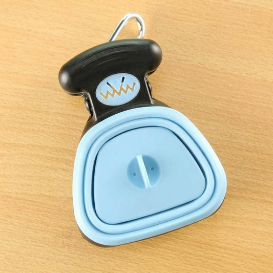 Blue pooper scooper folded — clean product shot